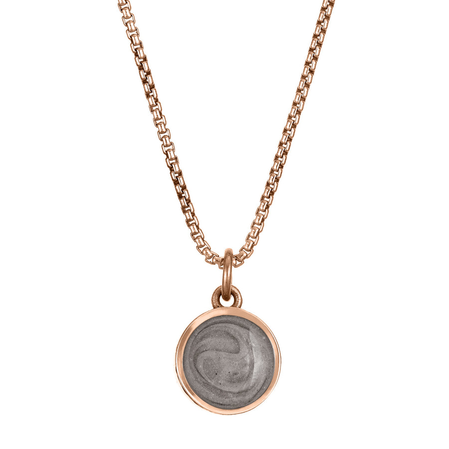This photo shows the 8mm Dome Ashes Necklace designed and set by close by me jewelry in 14K Rose Gold from the front