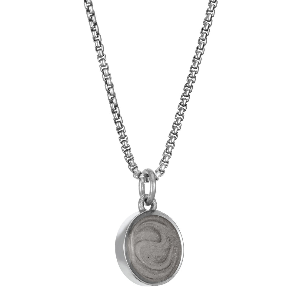 This photo shows the 8mm Dome Ashes Necklace designed and set by close by me jewelry in 14K White Gold from the side