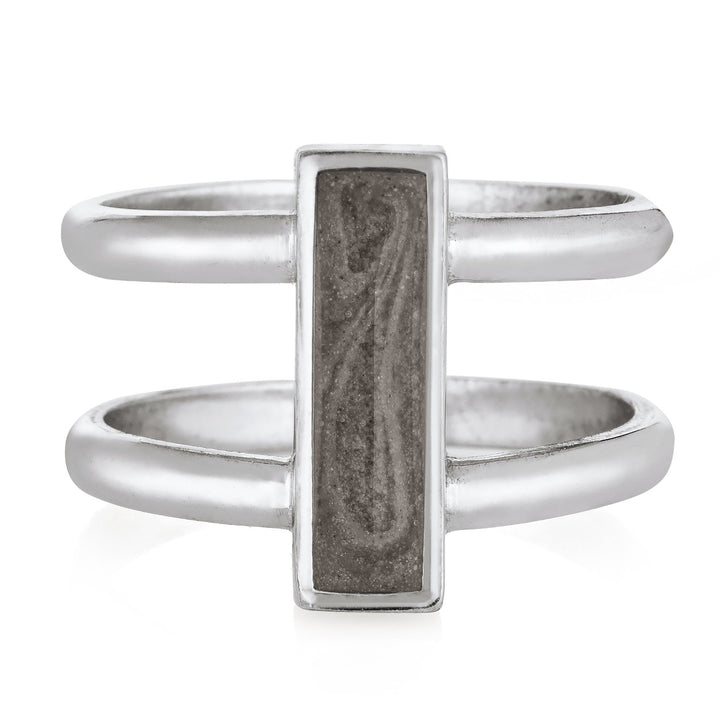 Pictured here is the 14K White Gold Bar Ashes Ring by close by me jewelry from the front to show its light grey cremation setting