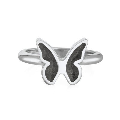 Pictured here is close by me jewelry's 14K White Gold Butterfly Cremation Ring design from the front to show its dark grey ashes setting in each wing