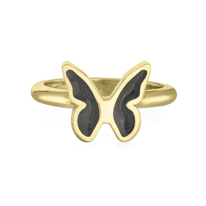 Pictured here is a 14K Yellow Gold Butterfly Ashes Ring Design by close by me jewelry from the front to show the dark gray setting in each wing
