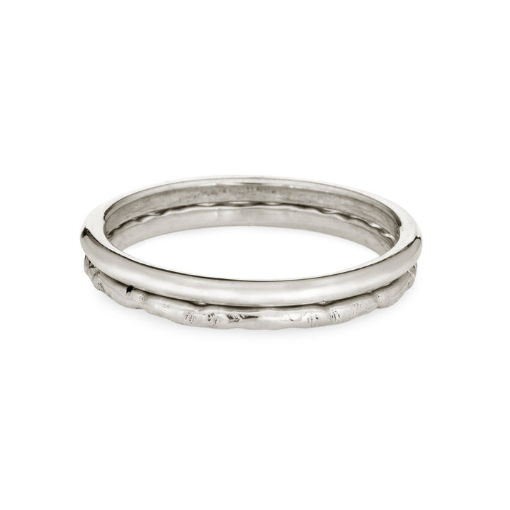 Pictured here are both the Smooth and Textured Companion Stacking Bands in Sterling Silver