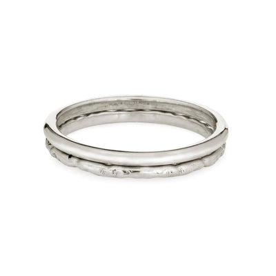 This photo shows both the Textured and Smooth Companion Stacking Rings designed by close by me jewelry to add to ashes stacking ring sets