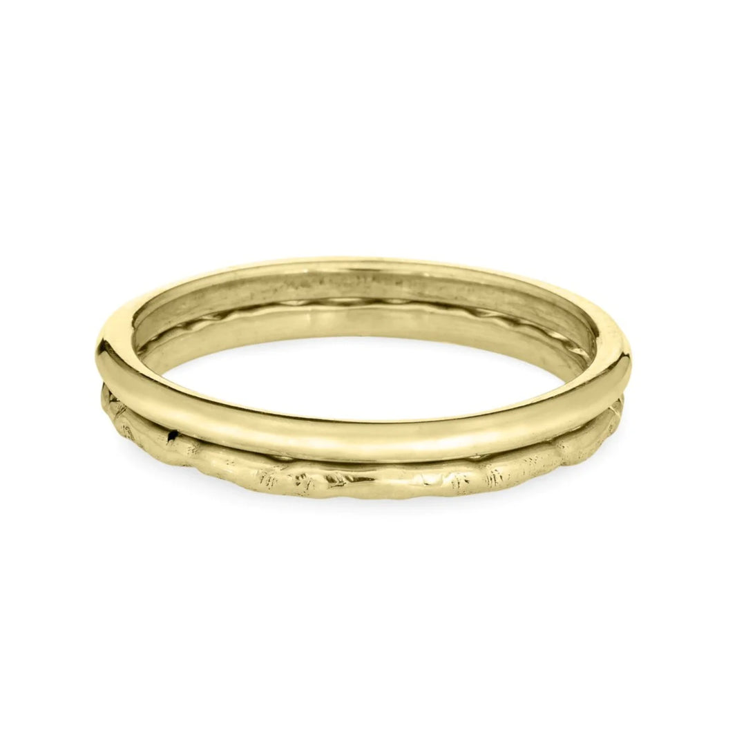Pictured here are both the Smooth and Textured Finish offered on close by me jewelry's 14K Yellow Gold Companion Rings