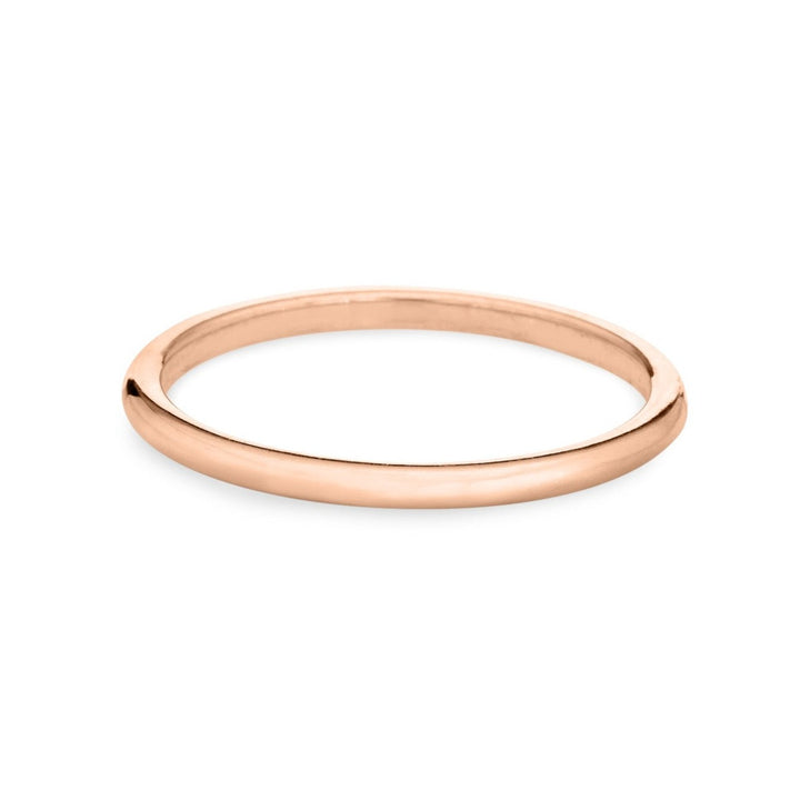 This photo shows the 14K Rose Gold Companion Stacking Ring by close by me jewelry in a smooth finish