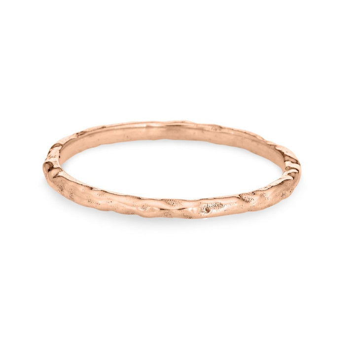 This photo shows the 14K Rose Gold Companion Stacking Ring by close by me jewelry in a textured finish