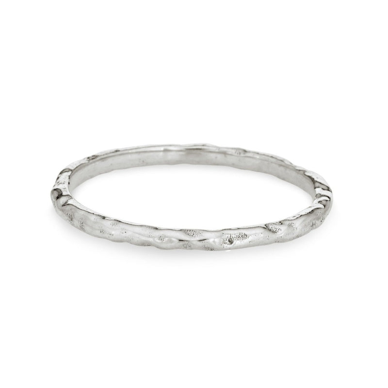 This photo shows the 14K White Gold Companion Stacking Ring by close by me jewelry in a textured finish