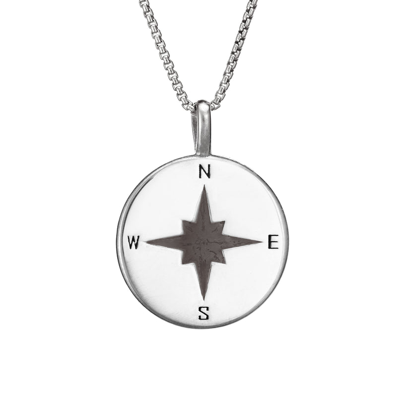 This photo shows the Compass Cremation Pendant design with a shiny finish by close by me jewelry in Sterling Silver from the front