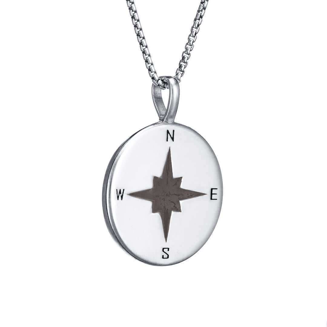 This photo shows the Compass Cremation Pendant design with a shiny finish by close by me jewelry in 14K White Gold from the side