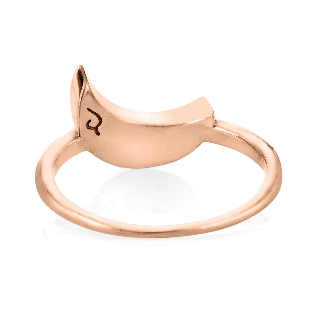 This photo shows the Crescent Moon Ring design by close by me jewelry in 14K Rose Gold from the back to show its light brown ashes setting