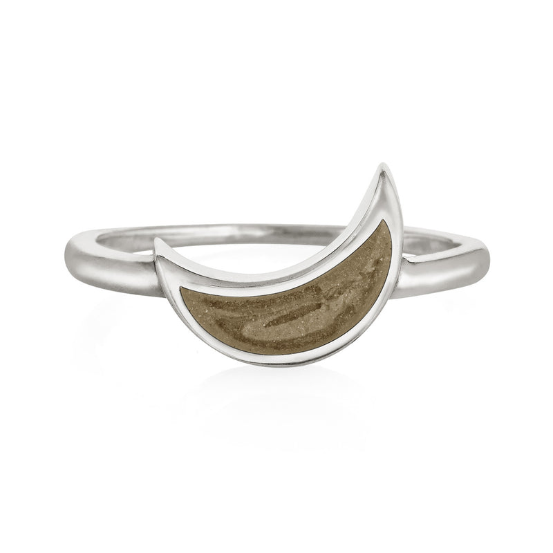 This photo shows the Sterling Silver Crescent Moon Ashes Ring design by close by me jewelry from the front to showcase its light brown cremains setting