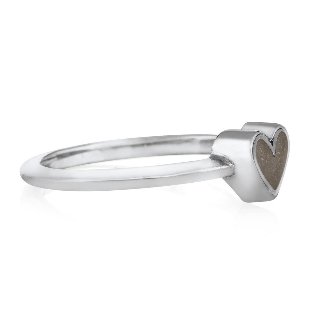 This photo shows the Dainty Heart Cremation Ring in 14K White Gold from the side