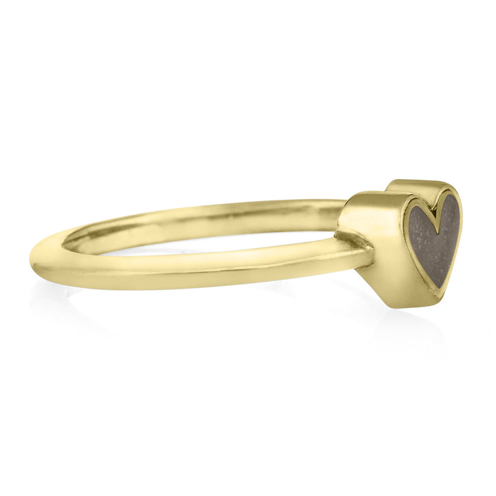 Pictured here is the Dainty Heart Cremains Ring design by close by me jewelry in 14K Yellow Gold from the side