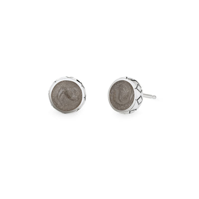 This photo shows the Detailed Circle Stud Cremains Earrings in Sterling Silver from the front