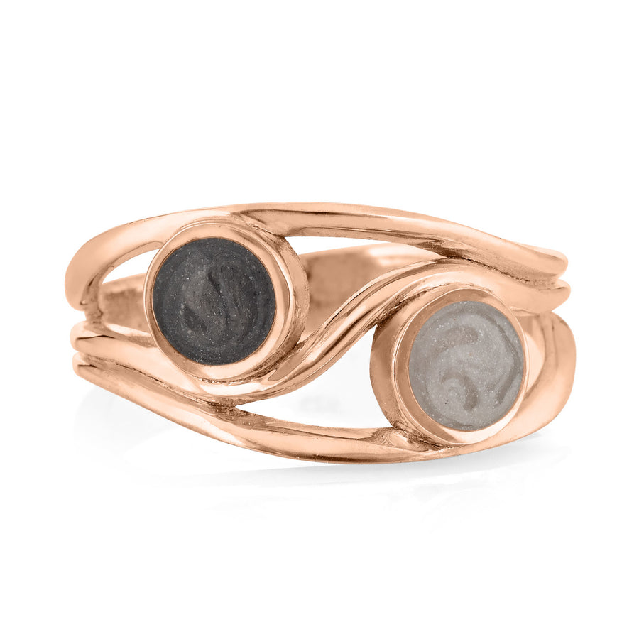 Pictured here is close by me jewelry's 14K Rose Gold Double Setting Ashes Ring design from the front to show its light gray and dark grey cremation settings