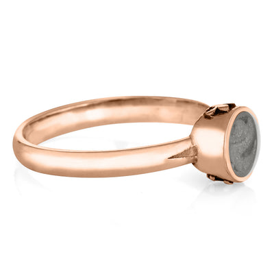 This photo shows the Fleur de Lis Cremation Ring for ashes by close by me jewelry in 14K Rose Gold from the side