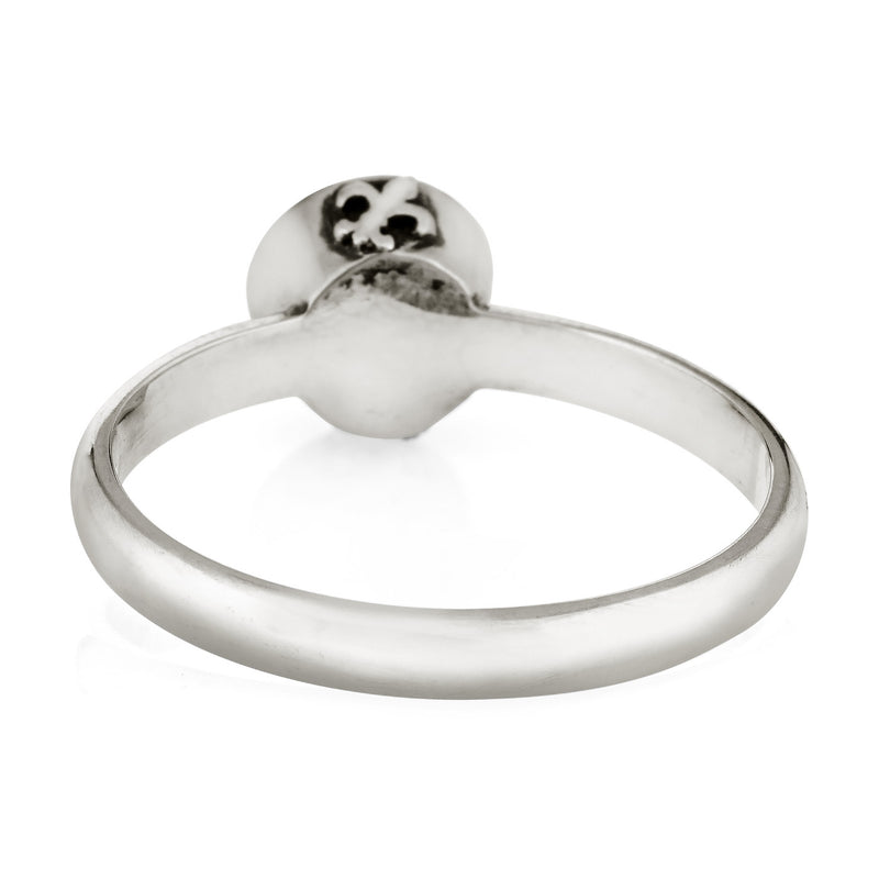 Pictured here is the Sterling Silver Fleur de Lis Ring with ashes designed by close by me jewelry from the back