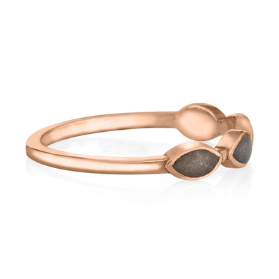 Pictured here is the 14K Rose Gold Four Setting Ashes Ring design by close by me jewelry from the side to show the thickness of its band and bezels