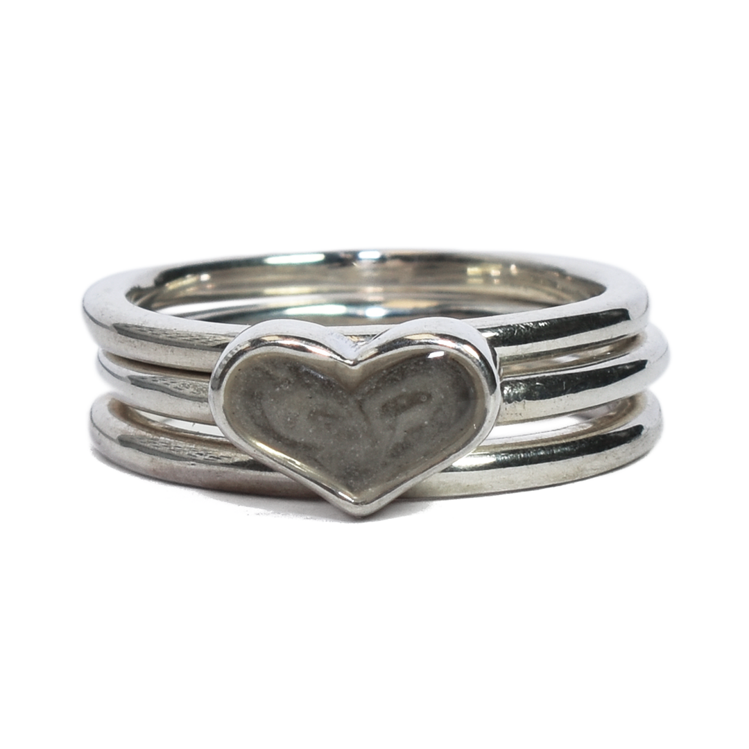 Pictured here is the Sterling Silver Heart Ashes Stacking Ring Set designed and set with cremains by close by me jewelry from the front