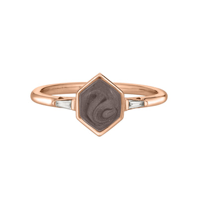Pictured here is close by me jewelry's 14K Rose Gold Hexagon Ashes Ring with White Baguette Diamonds from the front to show its medium gray ashes setting