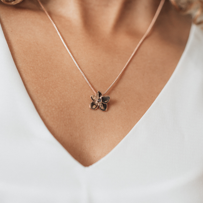 This photo shows a model wearing close by me jewelry&