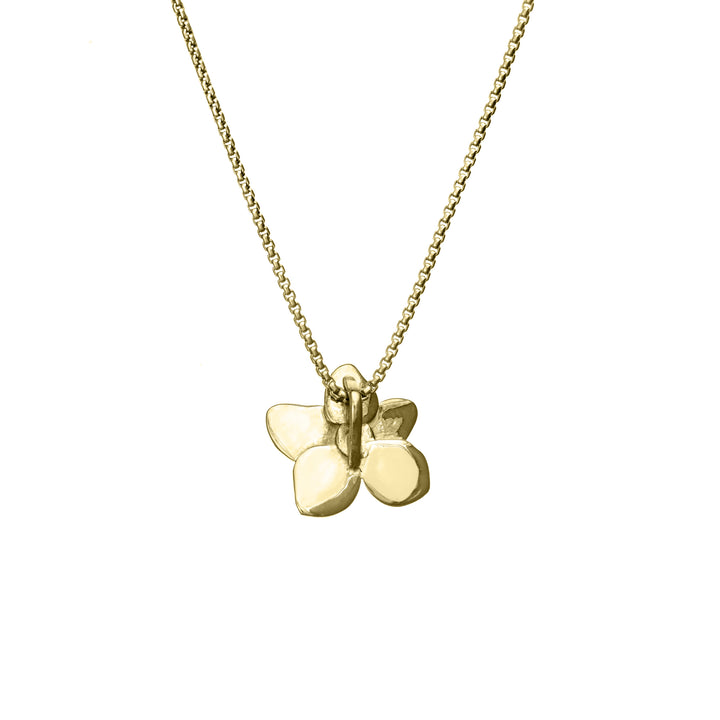 This photo shows the 14K Yellow Gold Hydrangea Ashes Pendant designed by close by me jewelry from the back