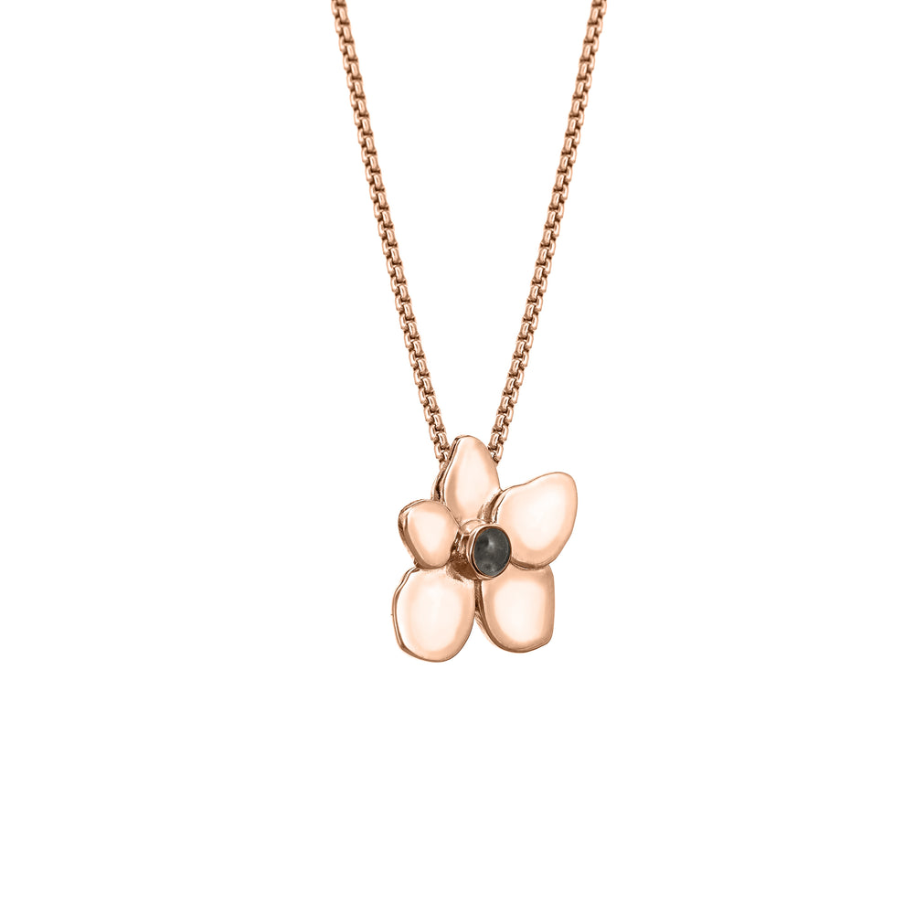 This photo shows the Hydrangea Flower Pendant with ashes designed by close by me jewelry in 14K Rose Gold from an angle