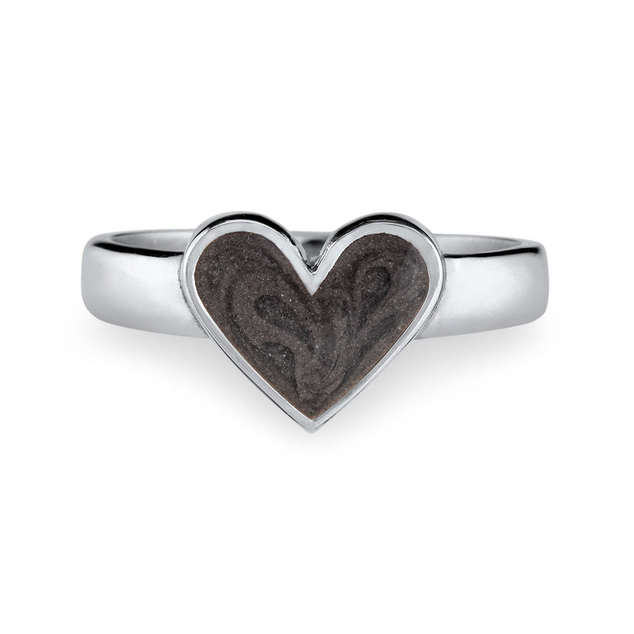 Pictured here is close by me jewelry's Imprint Heart Cremation Ring design in Sterling Silver from the front to show its dark grey ashes setting