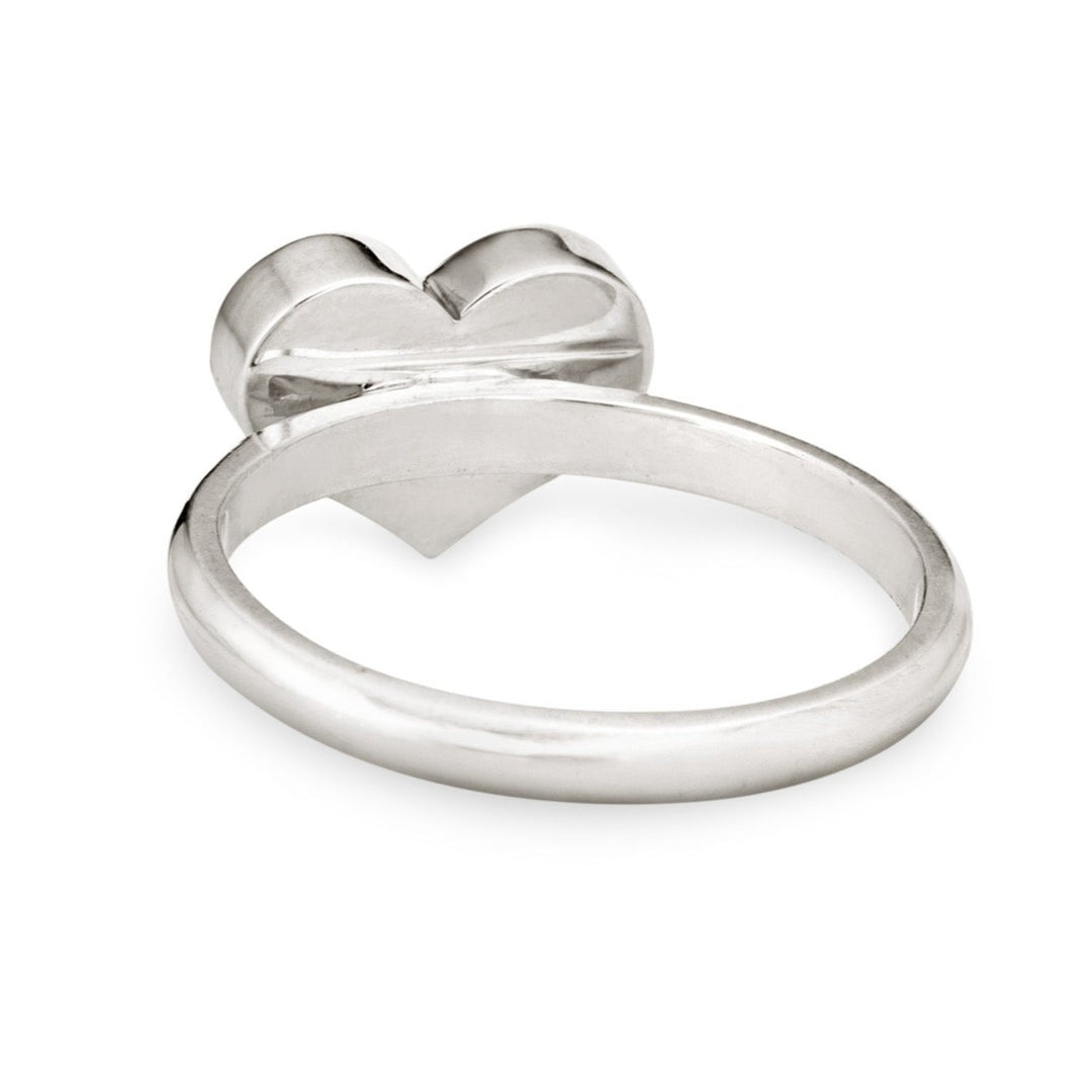 Pictured here is close by me jewelry's Sterling Silver Large Heart Stacking Cremation Ring from the back, showing its stacking band