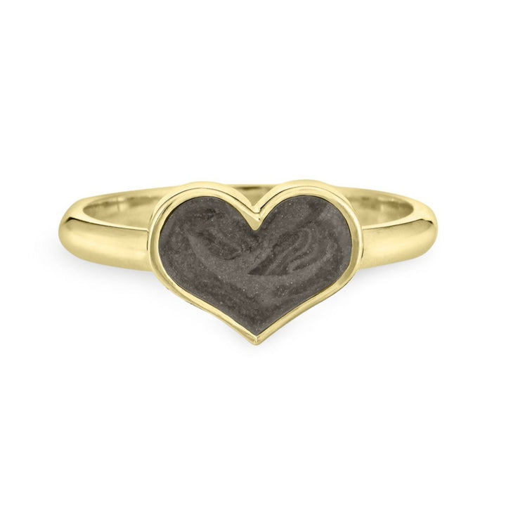 Pictured here is close by me jewelry's Large Heart Stacking Cremation Ring design in 14K Yellow Gold from the front with a dark gray ashes setting