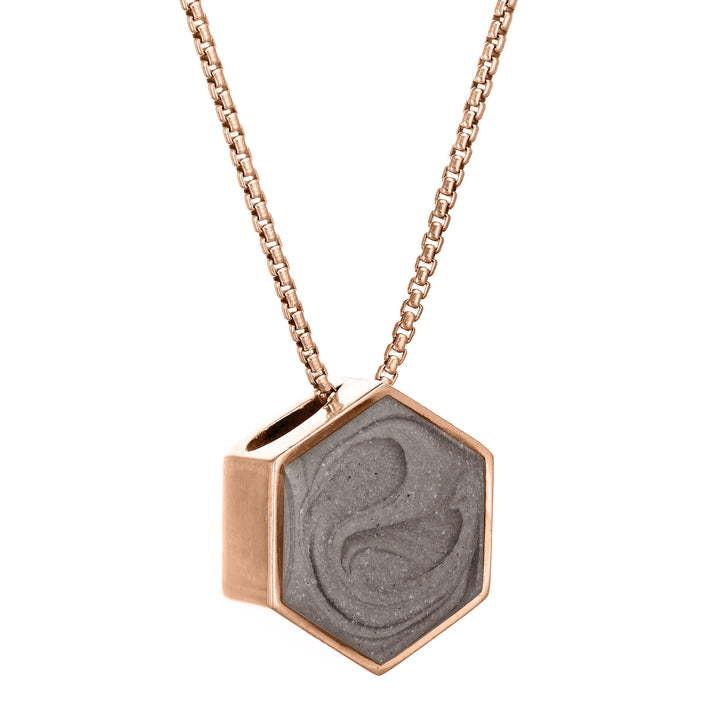 Pictured here is a side view of close by me's Large Hexagon Sliding Pendant in 14K Rose Gold