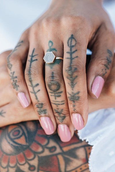 Pictured here is the 14K Yellow Gold Large Hexagon Stacking Ring design by close by me on a model's hand