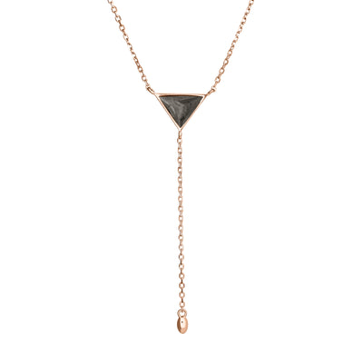 Pictured here is the Lariat Cremation Necklace design in 14K Rose Gold by close by me jewelry from the front to show its dark gray ashes setting and detailing