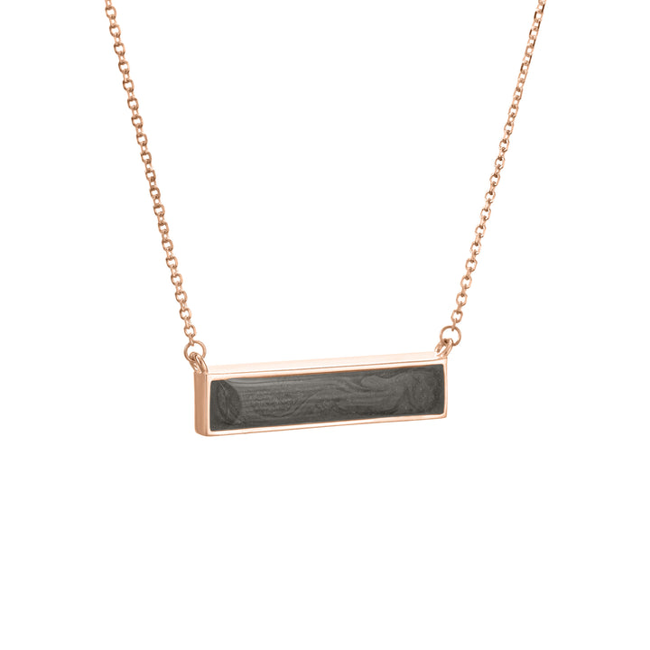 This photo shows close by me jewelry's 14K Rose Gold Lateral Bar Cremains Necklace from the side
