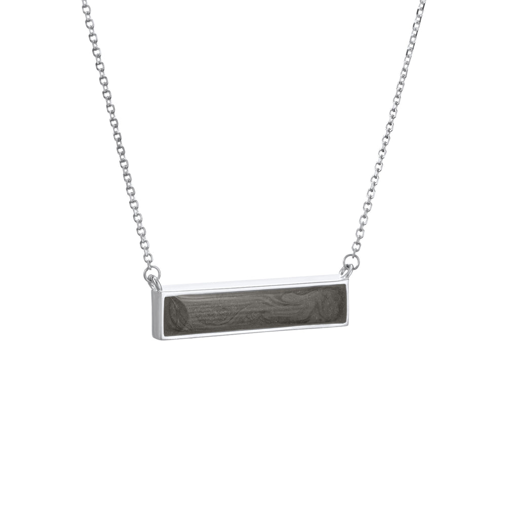 This photo shows close by me jewelry's 14K White Gold Lateral Bar Cremains Necklace from the side