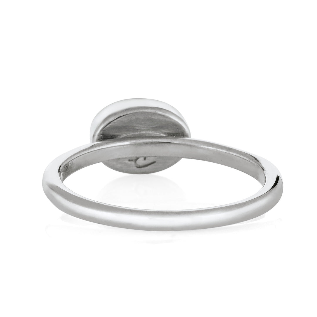 Pictured here is the Lateral Oval Ashes Stacking Ring design by close by me jewelry in 14K White Gold from the back