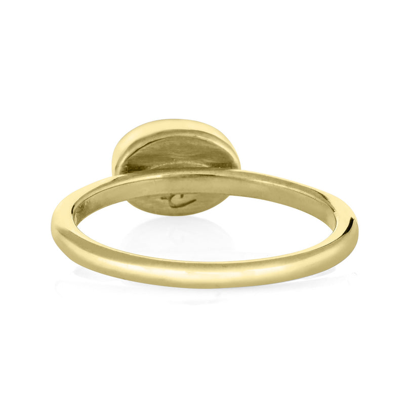 This photo shows the 14K Yellow Gold Lateral Oval Stacking Ashes Ring design by close by me jewelry from the back