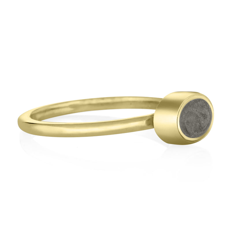 This photo shows the 14K Yellow Gold Lateral Oval Stacking Ashes Ring design by close by me jewelry from the side