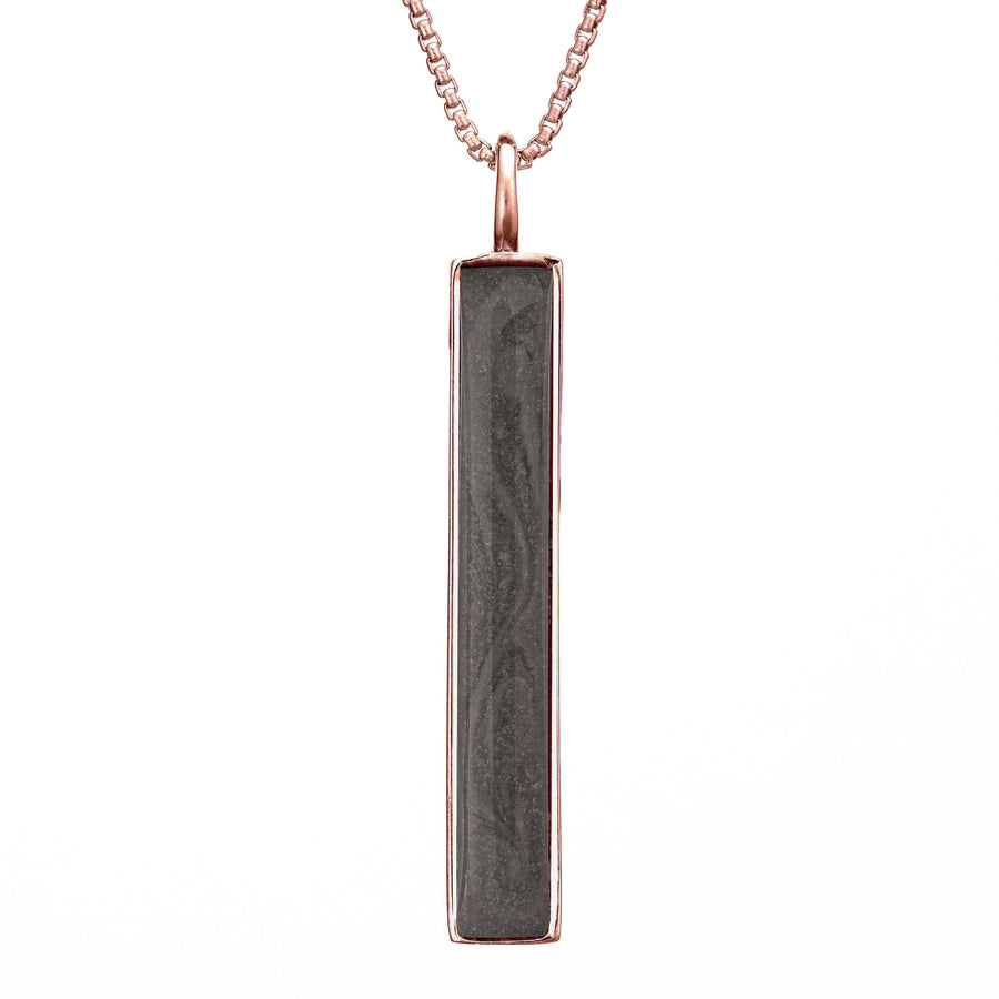 This photo shows the Long Bar Necklace with Ashes designed and set by close by me jewelry in 14K Rose Gold from the front