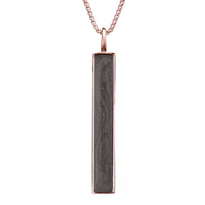This photo shows the Long Bar Necklace with Ashes designed and set by close by me jewelry in 14K Rose Gold from the front