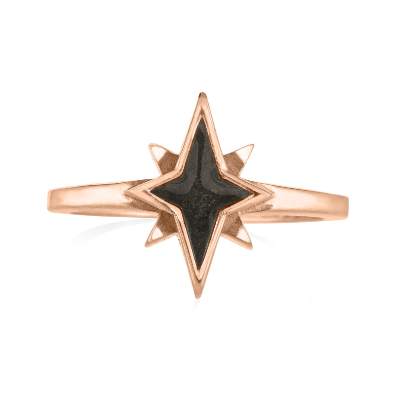 Pictured here is the 14K Rose Gold North Star Ashes Ring design by close by me jewelry from the front to show its dark gray ashes setting