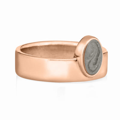 Pictured here is close by me jewelry's 14K Rose Gold Oval Crown Ashes Ring from the side