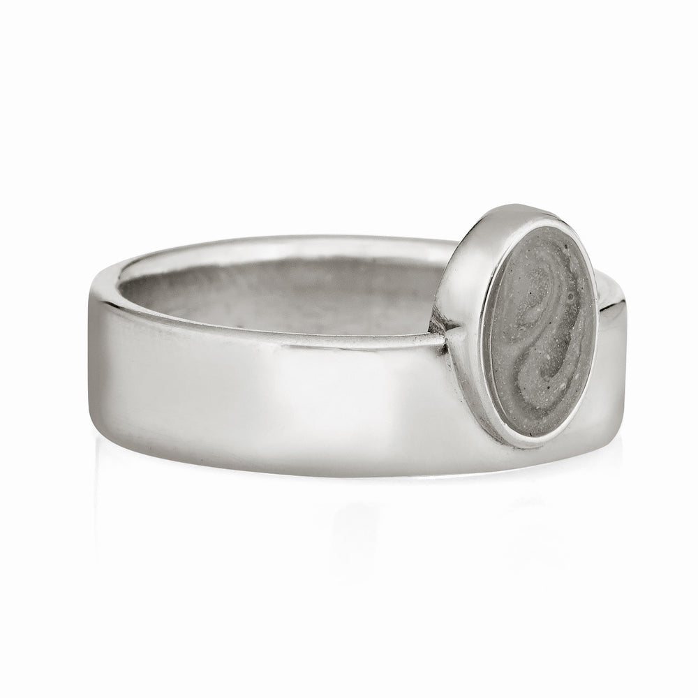 This photo shows close by me jewelry's Sterling Silver Oval Crown Ring with cremains from the side