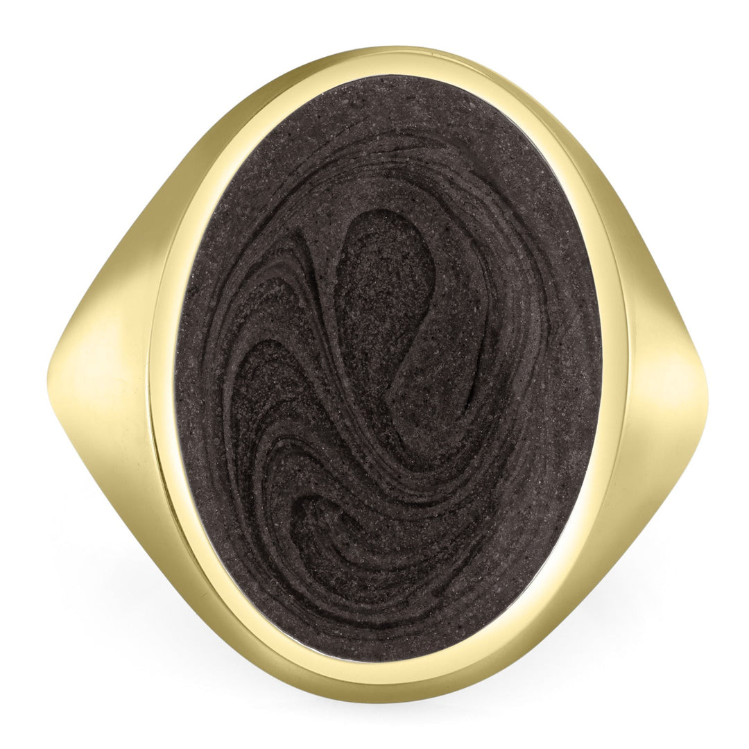 Pictured here is the 14K Yellow Gold Oval Signet Men's Ashes Ring design by close by me jewelry from the front to show its gray setting