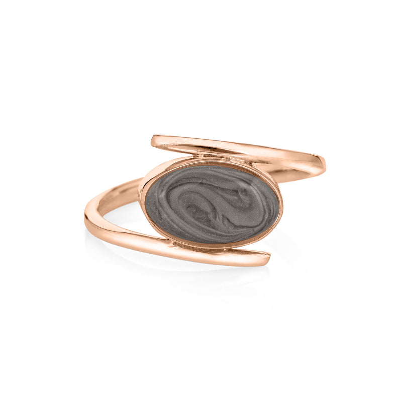 Pictured here is the 14K Rose Gold Oval Spiral Band Cremation Ring design in 14K Rose Gold by close by me jewelry from the front to show its medium grey ashes setting
