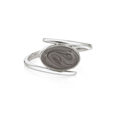 This photo shows the Oval Spiral Band Ashes Ring design in Sterling Silver by close by me jewelry from the front to show its medium gray cremation setting