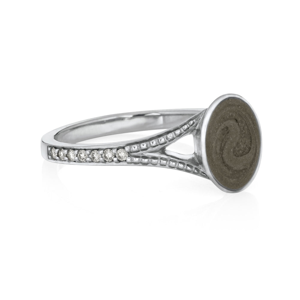 Pictured here is close by me jewelry's 14K White Gold Oval Split Shank White Diamond Band Ring design from the side to show its medium grey ashes setting, milgrain and diamond detailing on the band