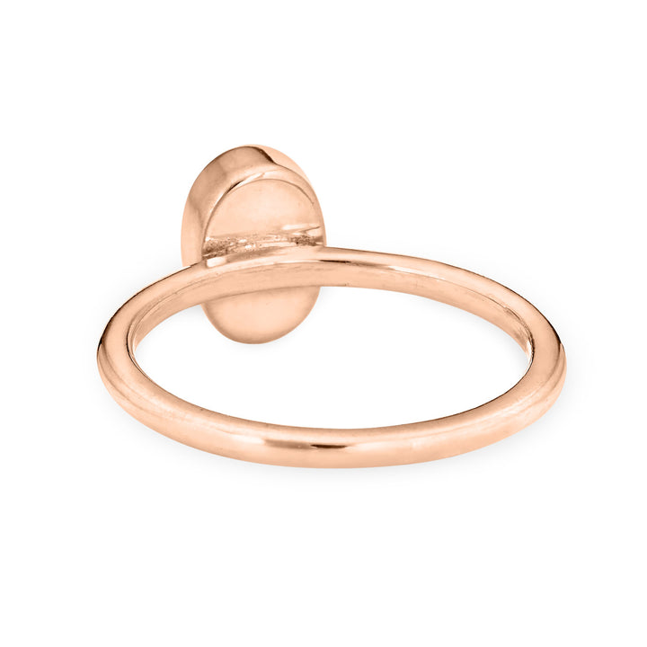 This photo shows the 14K Rose Gold Oval Stacking Cremation Ring designed by close by me jewelry from the back