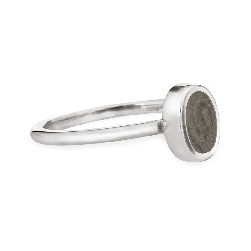 This photo shows the Oval Stacking Cremains Ring designed by close by me jewelry in Sterling Silver from the side