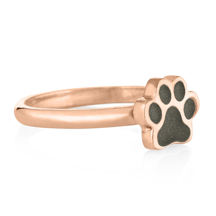Pictured here is the 14K Rose Gold Paw Print Stacking Cremation Ring design by close by me jewelry from the side to show the thickness of the bezel and band